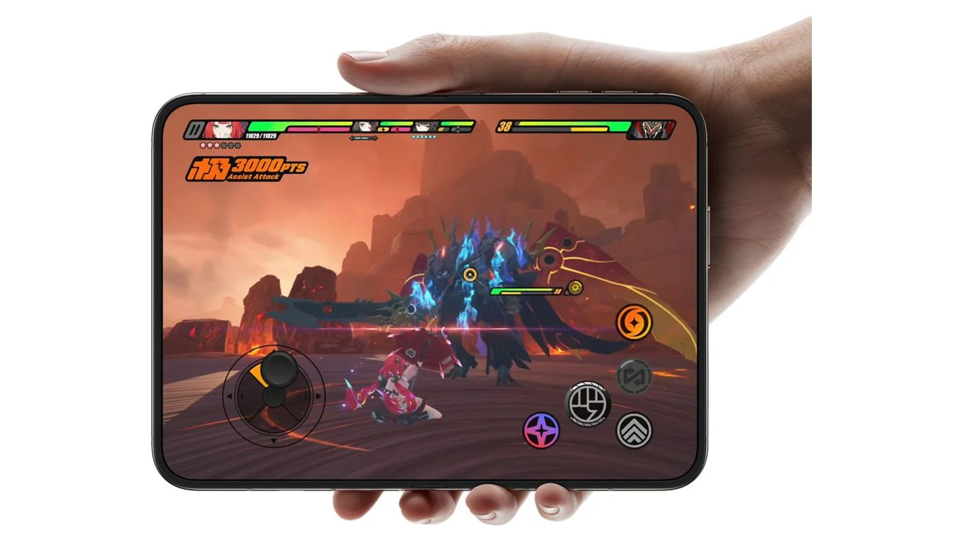 Hand holding an open iPhone Duo in landscape, playing a game across its 7.6-inch inner display
